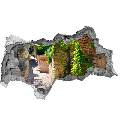 Decorazione da parete buco nel muro Una strada verdeggiante in città