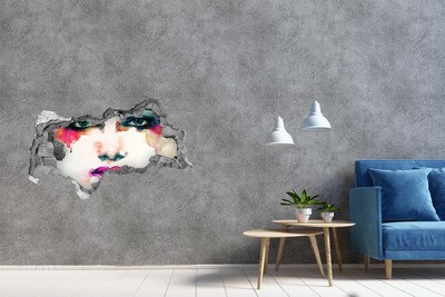 Sticker effetto rottura muro Un ritratto colorato in un buco nel muro