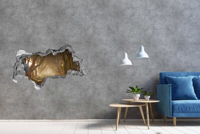 Adesivo con vista dietro il muro Un sentiero tra gli alberi