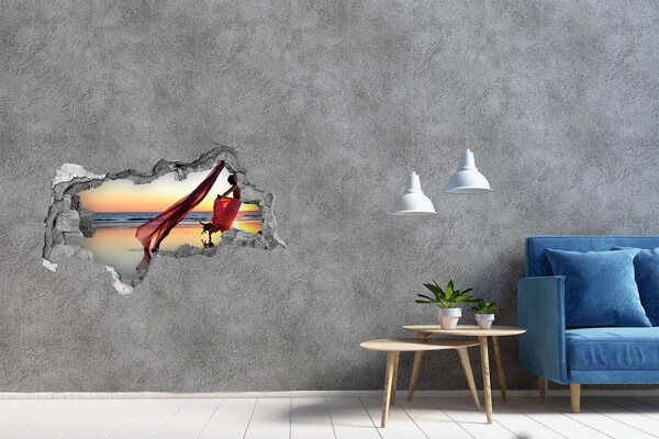 Sticker effetto rottura muro Ballare sulla spiaggia al tramonto