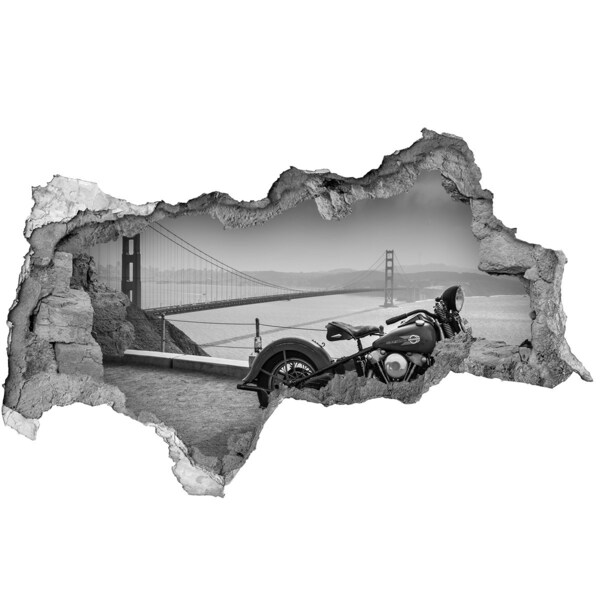 Adesivo con vista dietro il muro Motociclista al Golden Gate Bridge