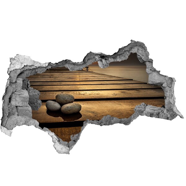 Adesivo con vista dietro il muro Tramonto sul molo