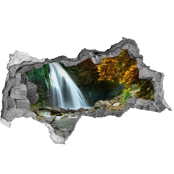 Sticker effetto rottura muro Cascata nella foresta autunnale