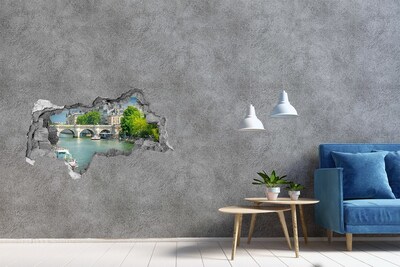 Adesivo con vista dietro il muro Vista di Parigi attraverso un buco nel muro