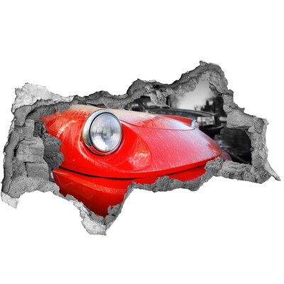 Decorazione da parete buco nel muro Auto sportiva rossa dietro il buco nel muro
