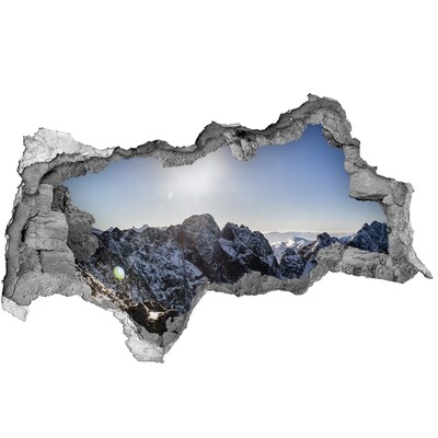 Sticker effetto rottura muro Paesaggio montano illuminato dai raggi del sole