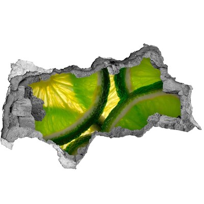 Adesivo con vista dietro il muro Lime succosi in un buco nel muro