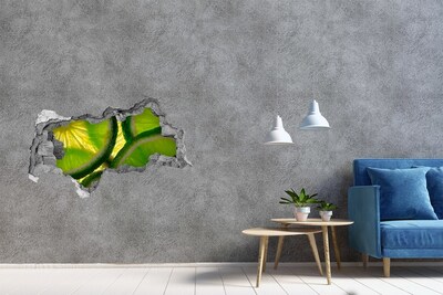 Adesivo con vista dietro il muro Lime succosi in un buco nel muro