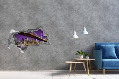 Adesivo con vista dietro il muro Ponte di Brooklyn di notte