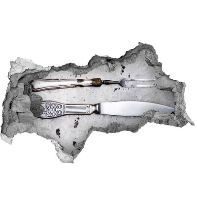 Decorazione da parete buco nel muro Un muro danneggiato con utensili da cucina