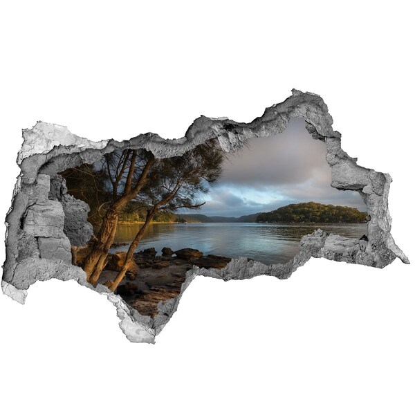 Adesivo con vista dietro il muro Pace in riva all'acqua