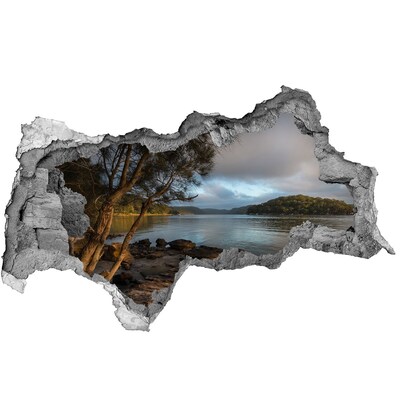 Adesivo con vista dietro il muro Pace in riva all'acqua