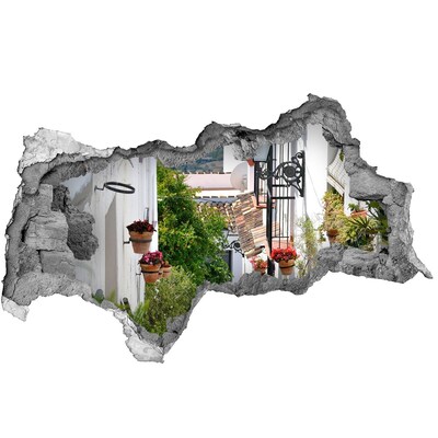 Decorazione da parete buco nel muro Una strada affascinante in un villaggio bianco