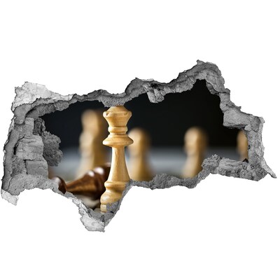 Adesivo con vista dietro il muro Giocare a scacchi attraverso un buco nel muro