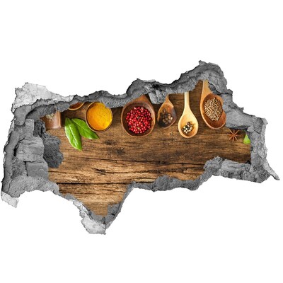 Sticker effetto rottura muro Spezie da cucina su un piano di lavoro in legno