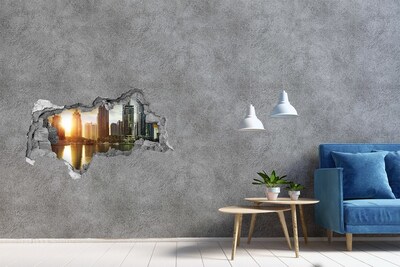 Adesivo con vista dietro il muro Una città moderna in riva all'acqua