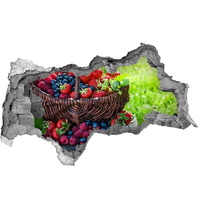 Decorazione da parete buco nel muro Un cesto pieno di frutti di bosco