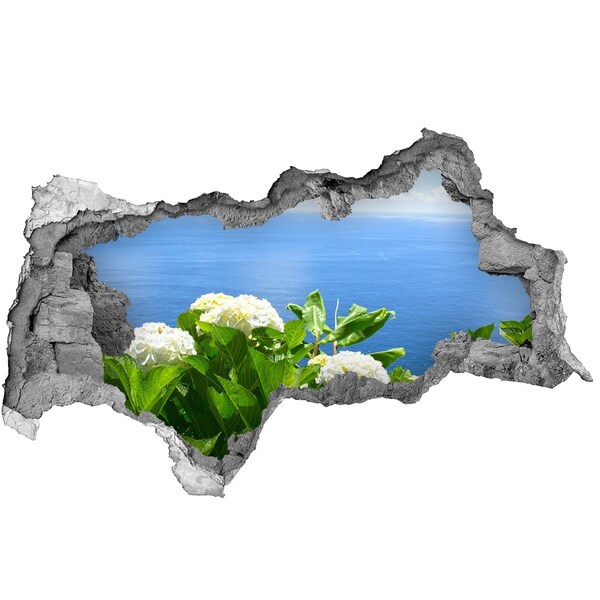 Adesivo con vista dietro il muro Vista del mare attraverso un buco nel muro