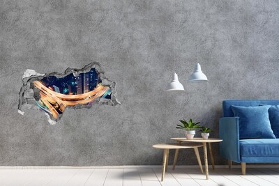 Adesivo con vista dietro il muro Veduta notturna della città