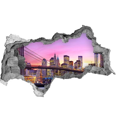 Sticker effetto rottura muro Lo skyline di New York al tramonto