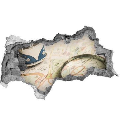Sticker effetto rottura muro Mappa con lente d'ingrandimento in un buco nel muro