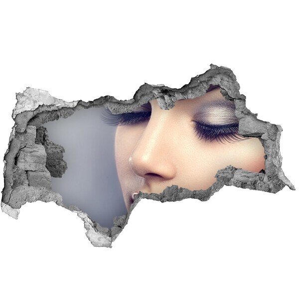 Adesivo con vista dietro il muro Un volto sensuale in un muro in rovina