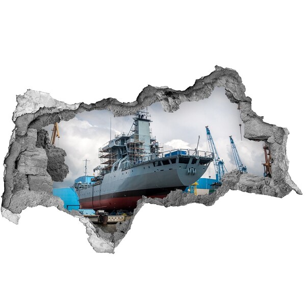 Adesivo con vista dietro il muro Una nave nel cantiere navale
