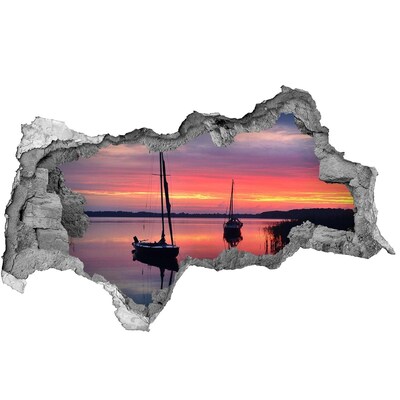 Sticker effetto rottura muro Tramonto sul lago