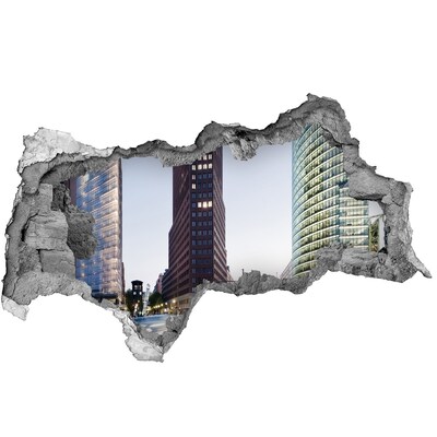 Sticker effetto rottura muro Veduta della città moderna