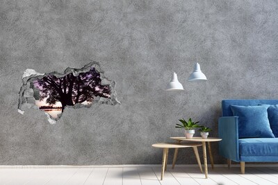 Sticker effetto rottura muro Tramonto dietro l'albero