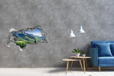 Decorazione da parete buco nel muro Paesaggio montano visto attraverso un buco nel muro