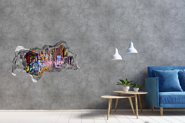 Adesivo con vista dietro il muro Una strada piena di graffiti