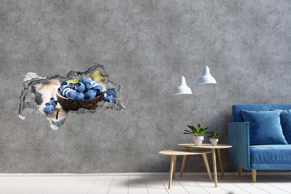 Adesivo con vista dietro il muro Bacche in una ciotola di legno