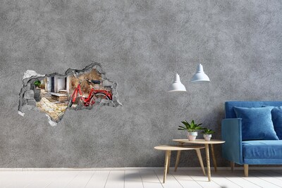 Decorazione da parete buco nel muro Una bicicletta rossa in una strada affascinante