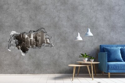 Sticker effetto rottura muro Vista della città da un buco nel muro