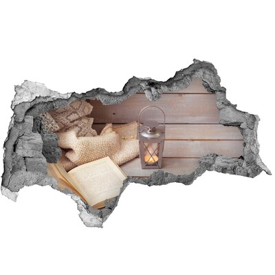 Adesivo con vista dietro il muro Un angolo accogliente con una lanterna