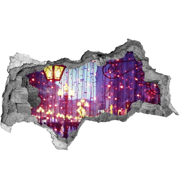 Adesivo con vista dietro il muro Luci di Natale in città