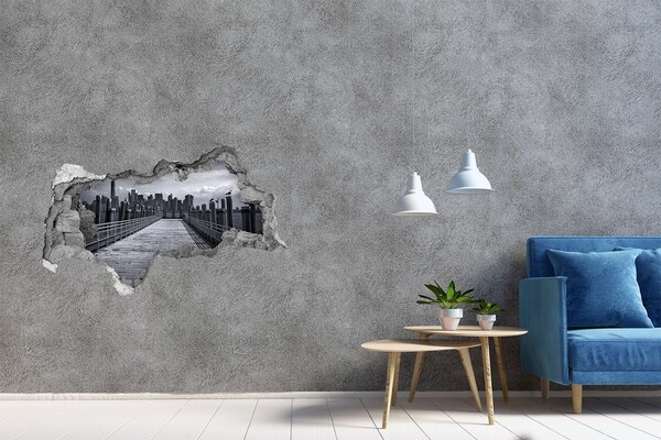 Adesivo con vista dietro il muro Vista della città dal molo