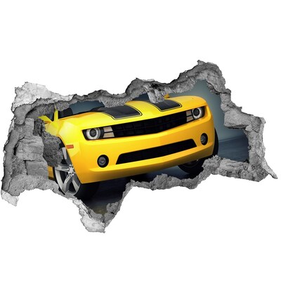 Decorazione da parete buco nel muro Un muro in rovina con un'auto gialla