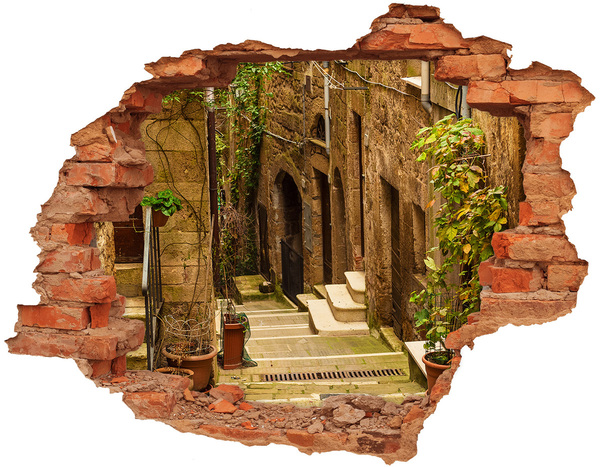 Adesivo con buco sbrecciato Una strada affascinante in città