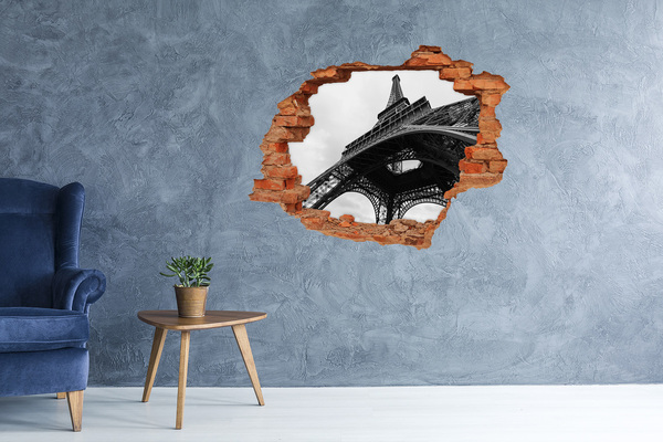 Adesivo effetto buco nel muro La Torre Eiffel in un ambiente monocromatico