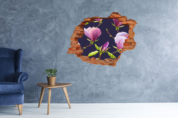 Adesivo con buco sbrecciato Fiori di magnolia sbocciano attraverso un buco nel muro