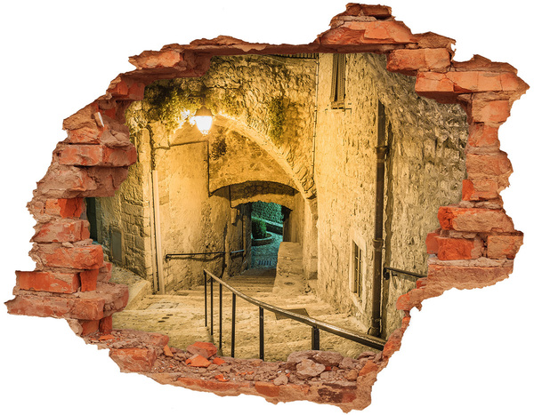 Adesivo con buco sbrecciato Una strada storica nel centro storico