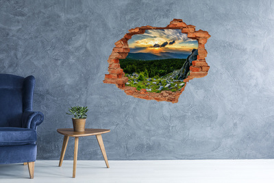 Adesivo murale buco 3D Tramonto in montagna