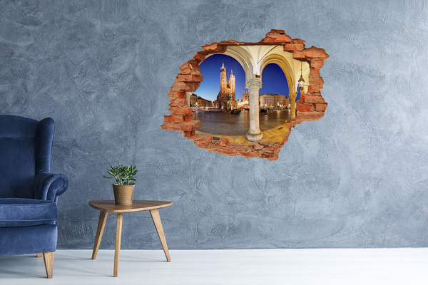 Adesivo con buco sbrecciato La piazza del mercato principale di Cracovia di notte