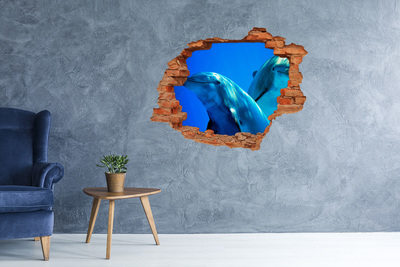 Adesivo murale buco 3D Delfini nell'oceano