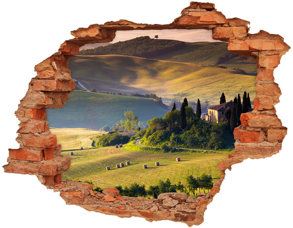 Adesivo con buco sbrecciato Il paesaggio idilliaco della Toscana