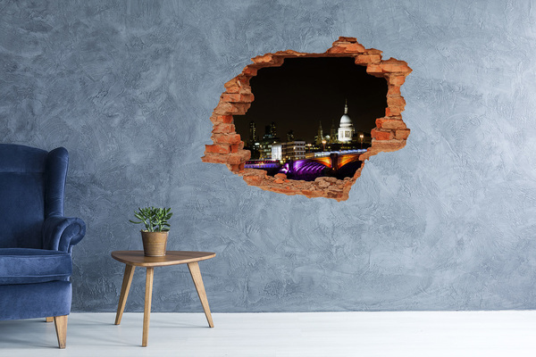 Adesivo effetto buco nel muro Vista notturna di Londra attraverso un buco nel muro