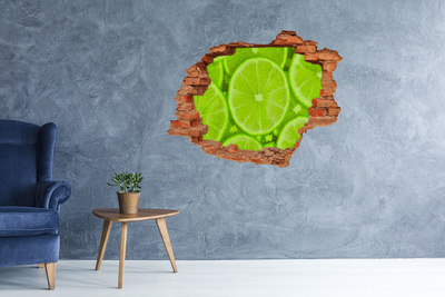Adesivo con buco sbrecciato Lime succoso in un buco nel muro