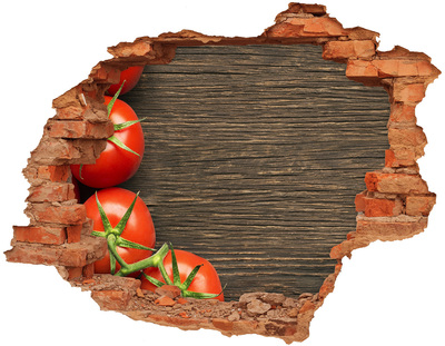 Adesivo con buco sbrecciato Pomodori freschi in un muro danneggiato